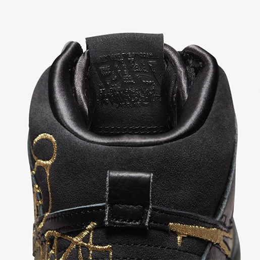 SB Dunk High FAUST Black Gold–Elegante